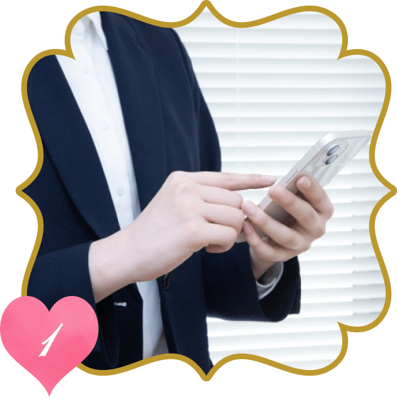 スマートフォンで申し込みをする手元